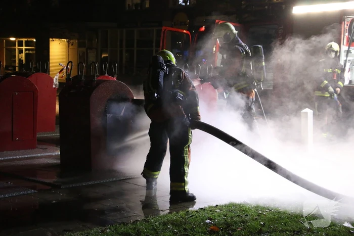 Ondergrondse container in brand