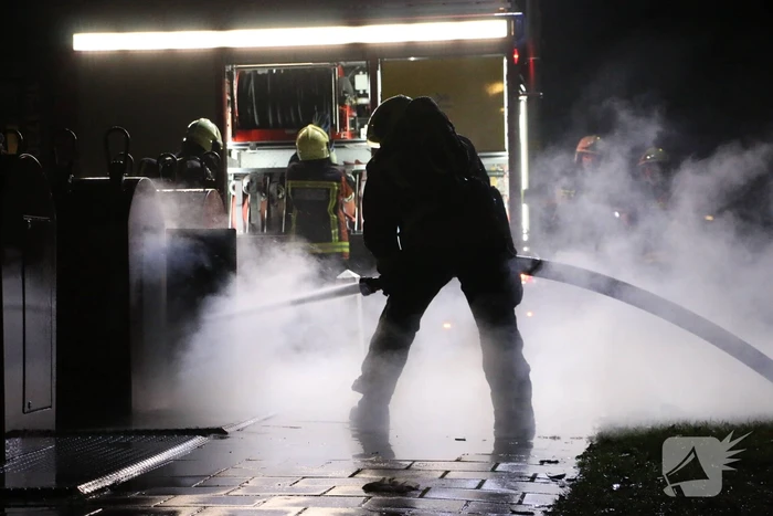 Ondergrondse container in brand