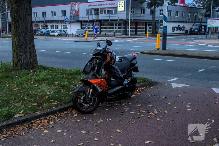 Aanrijding tussen scooter en bestelbus