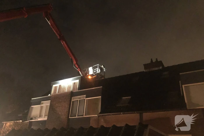 Brand in schoorsteen van woning