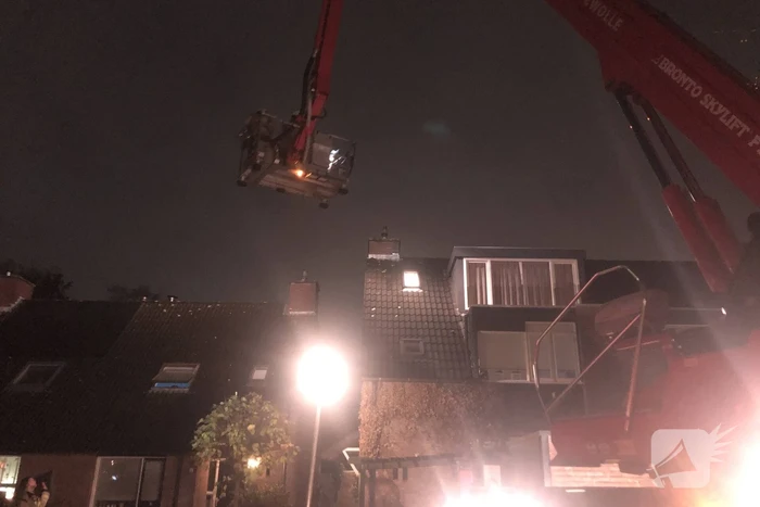 Brand in schoorsteen van woning