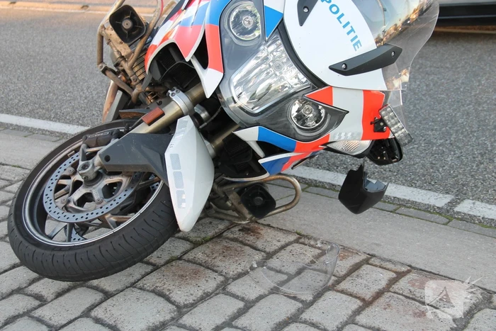 Motoragent aangereden door auto