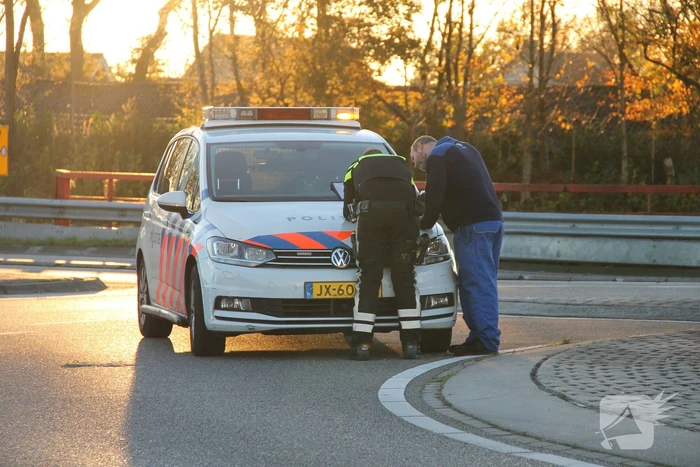 Motoragent aangereden door auto