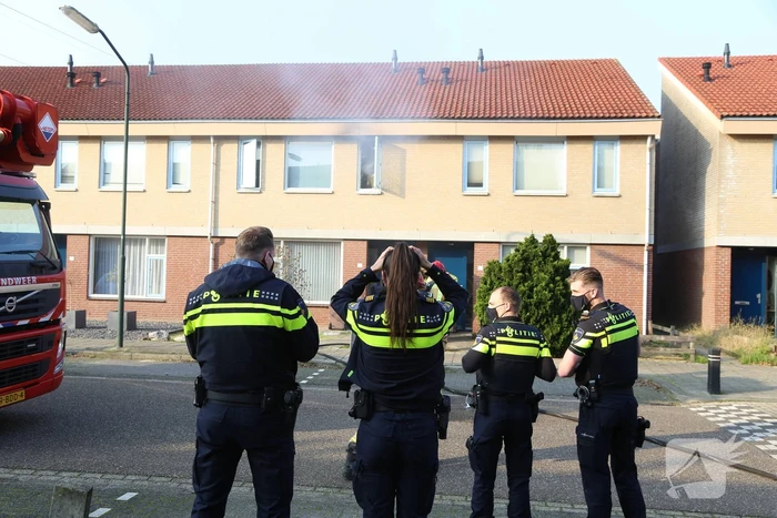 Brand in badkamer van woning