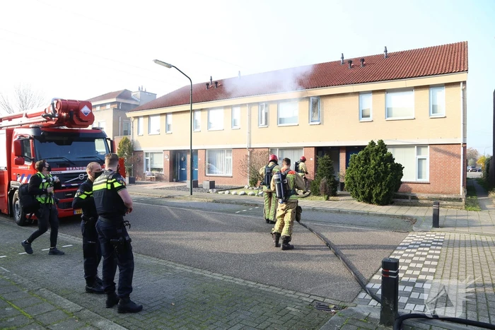 Brand in badkamer van woning