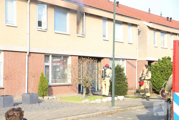 Brand in badkamer van woning