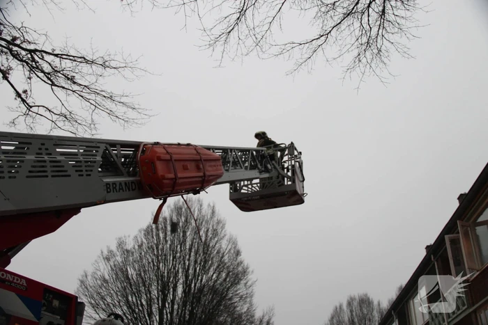 Brand in een trappenhuis van flatgebouw
