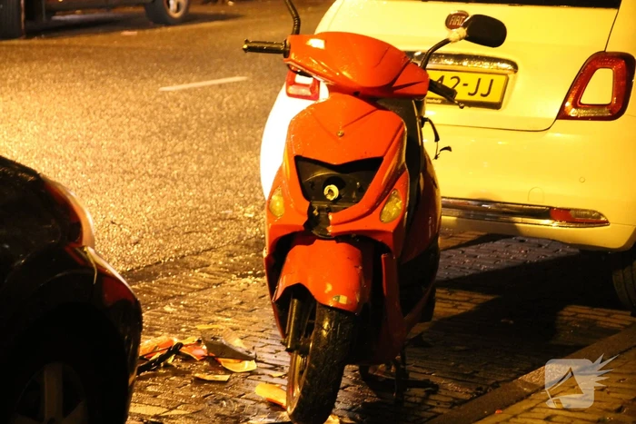 Flinke schade na botsing tussen scooter en auto