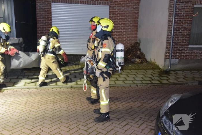 Schoorsteen geveegd na brand