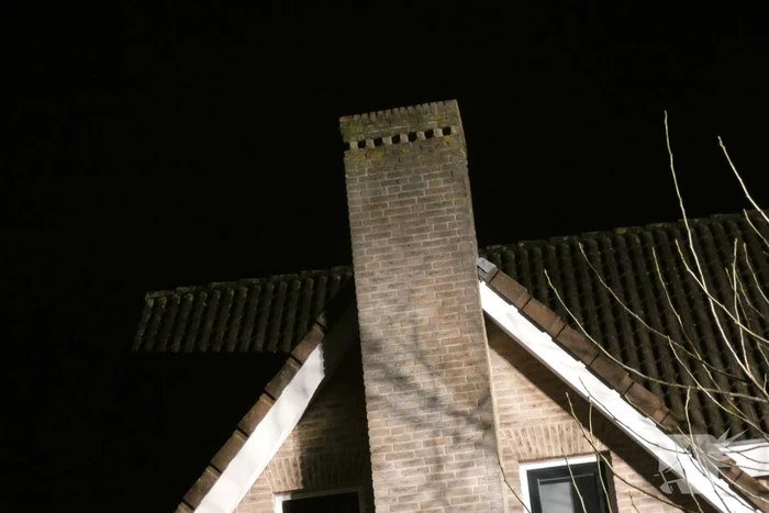 Schoorsteen geveegd na brand