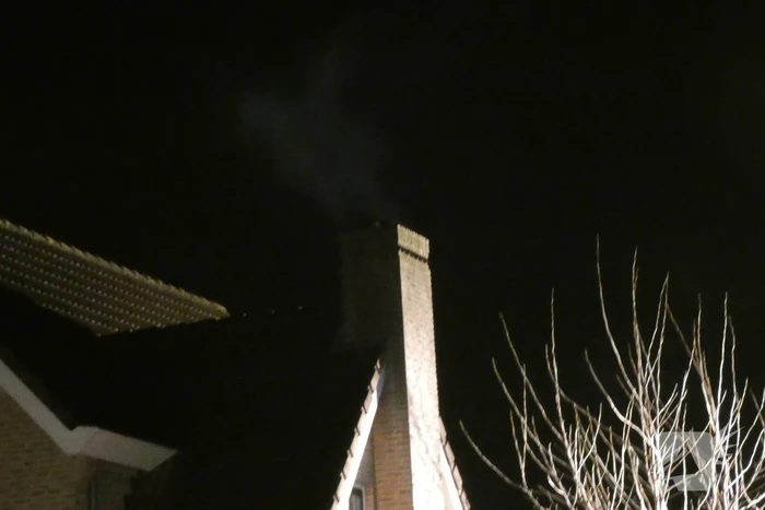 Schoorsteen geveegd na brand