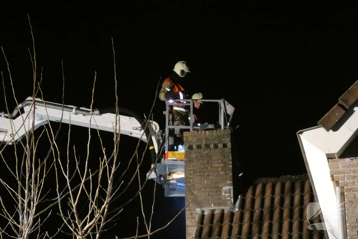 Schoorsteen geveegd na brand