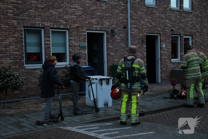 Wasdroger in brand in woning