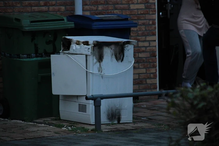 Wasdroger in brand in woning