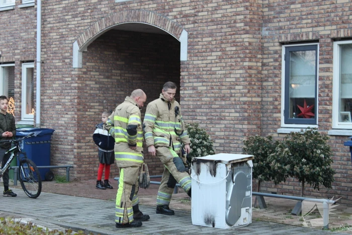 Wasdroger in brand in woning