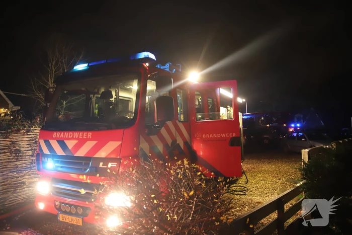 Flinke brand in houten chalet