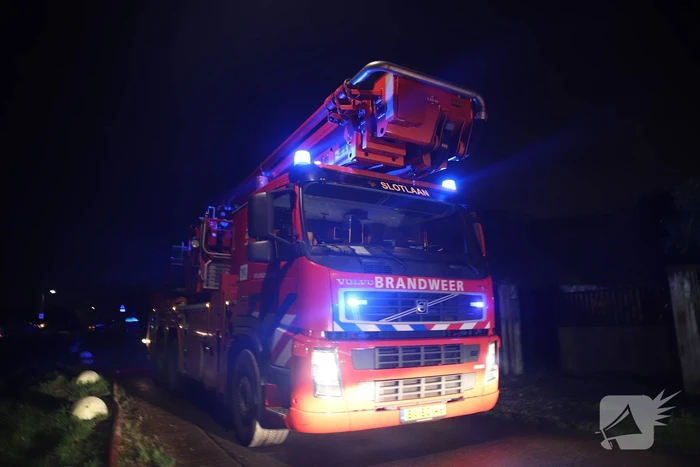 Flinke brand in houten chalet