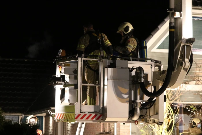 Brand in schoorsteen van woning