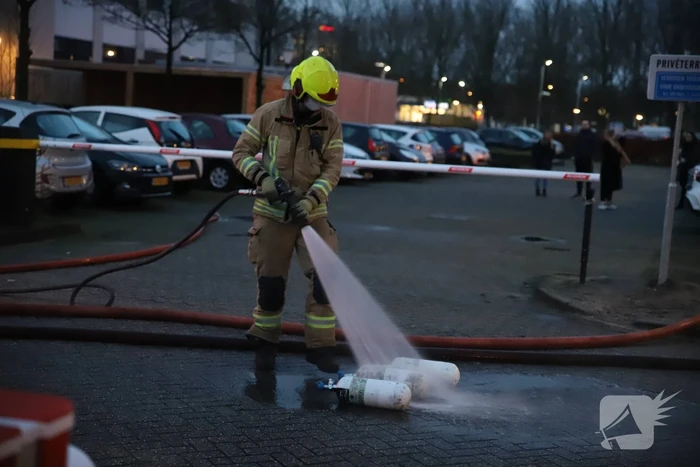 Appartementencomplex vol rook door brand