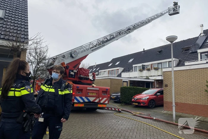 Flinke brand op zolder van woning