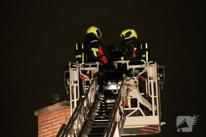 Uitslaande brand in schoorsteen