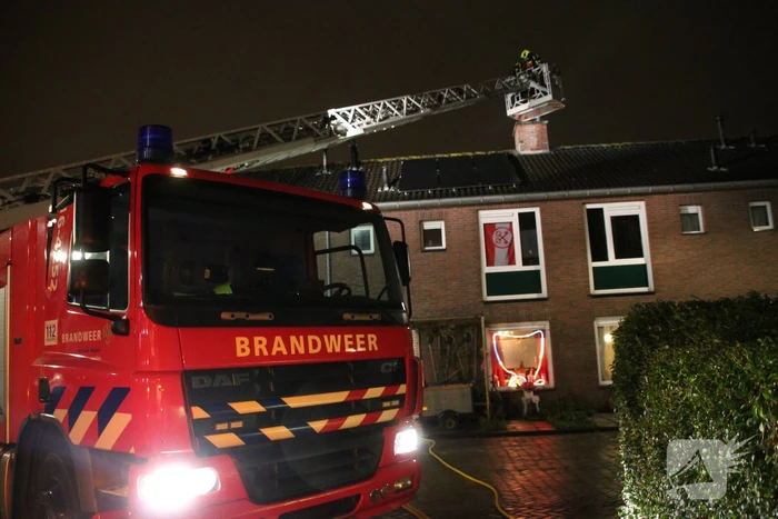 Uitslaande brand in schoorsteen