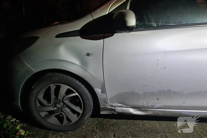 Botsing tussen auto en een bezorg scooter