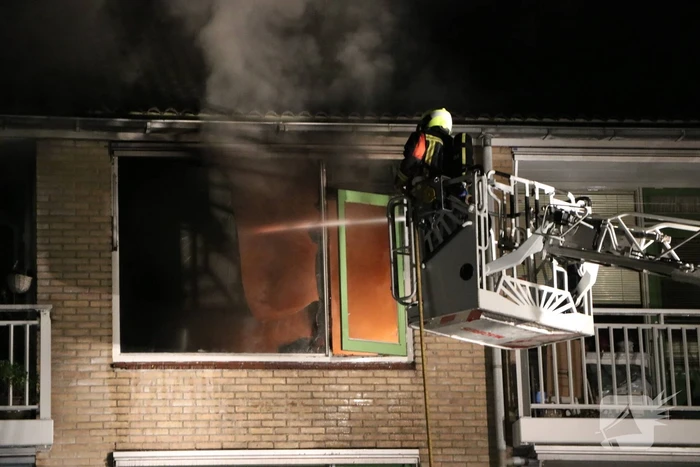 Flinke uitslaande brand in woning