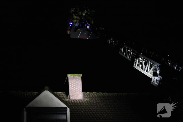 Brand in schoorsteen van woning