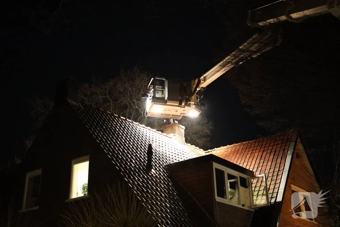 Brand in schoorsteen van woning