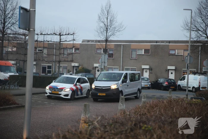 Flinke vlammen bij brand in kledingcontainer