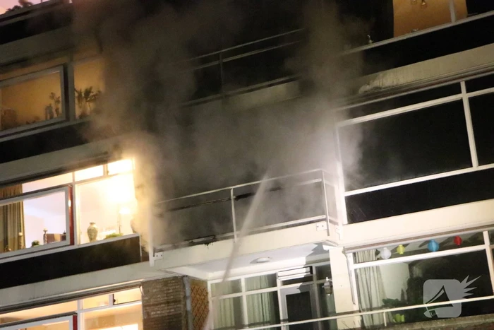 Uitslaande brand in flatwoning