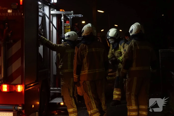 Afvalbrand in bosgebied