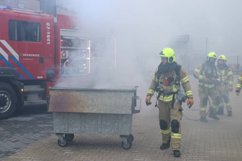 Afvalcontainer vat vlam