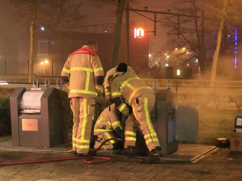 Brand ontstaan in ondergrondse container