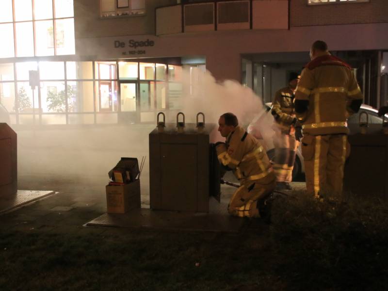 Brand ontstaan in ondergrondse container