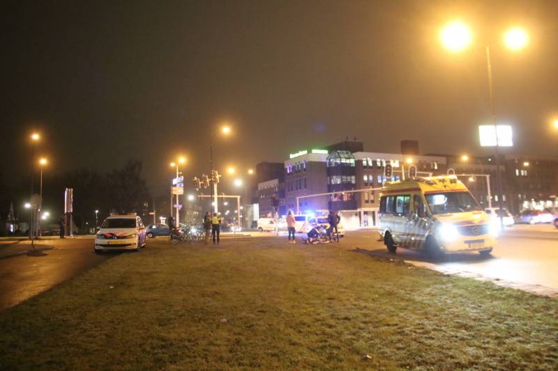 Fietsers aangereden door politieauto