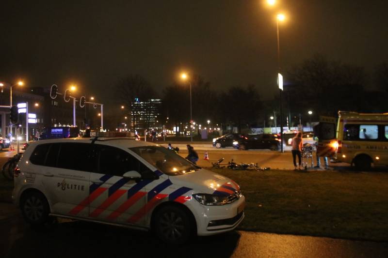 Fietsers aangereden door politieauto