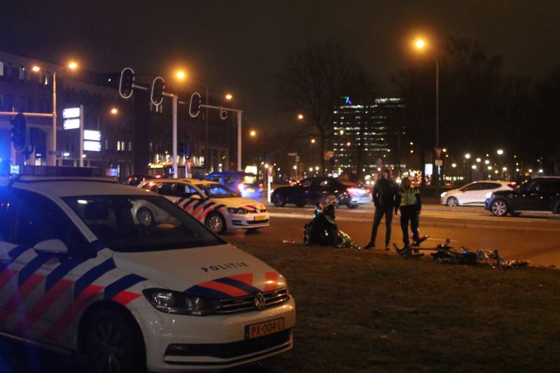 Fietsers aangereden door politieauto