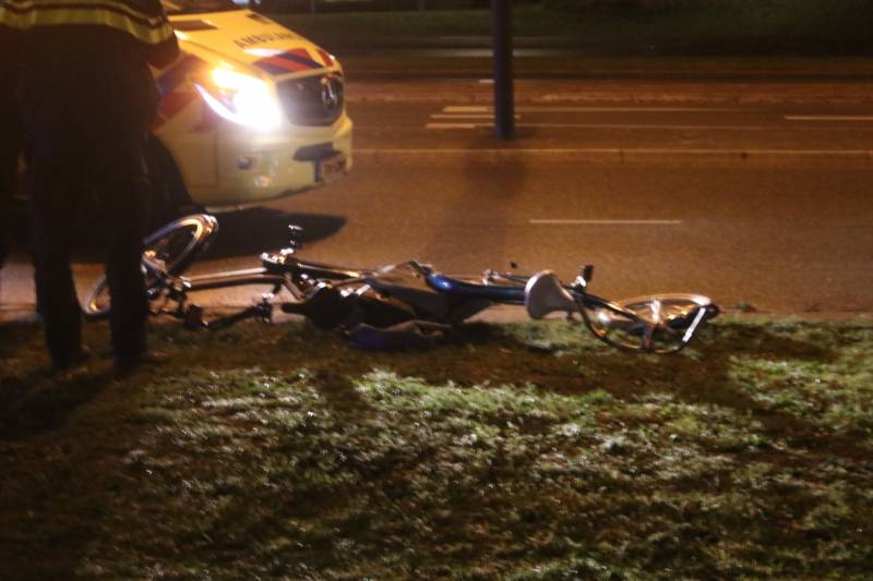 Fietsers aangereden door politieauto