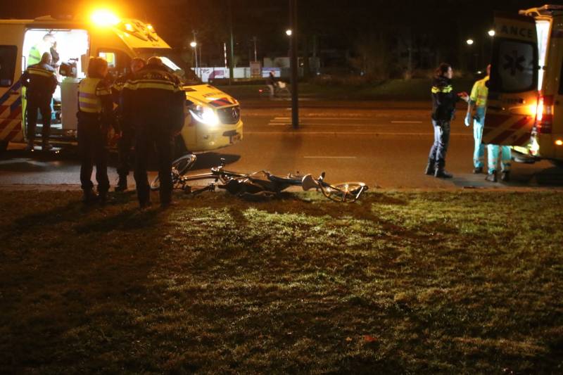 Fietsers aangereden door politieauto