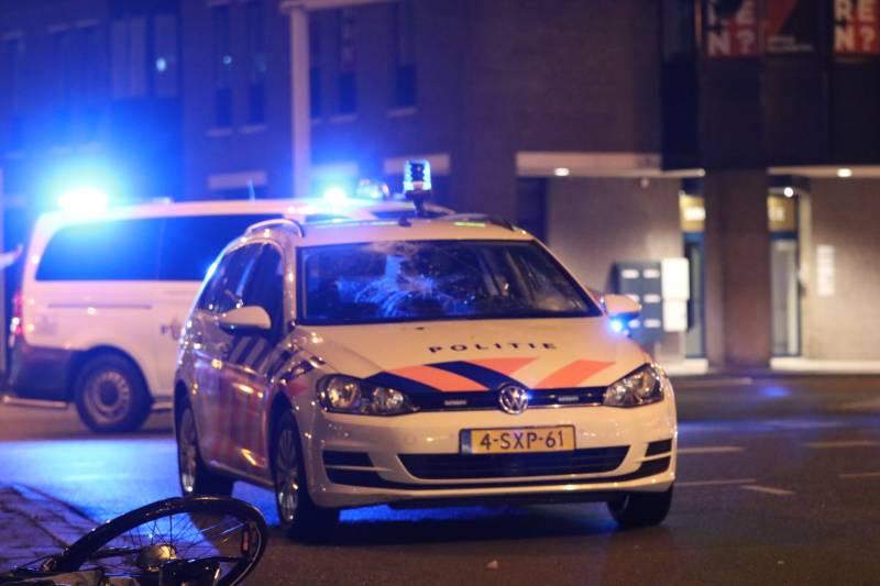 Fietsers aangereden door politieauto