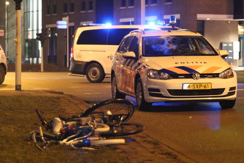 Fietsers aangereden door politieauto