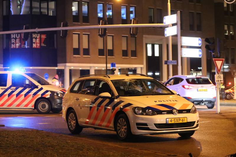 Fietsers aangereden door politieauto