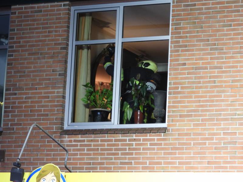 Brand in schoorsteen bovenwoning winkelpand