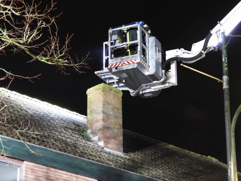Brand in schoorsteen bovenwoning winkelpand