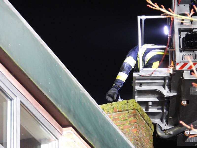 Brand in schoorsteen bovenwoning winkelpand