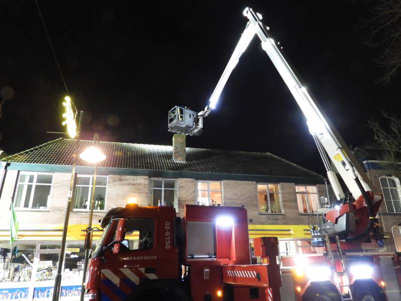 Brand in schoorsteen bovenwoning winkelpand