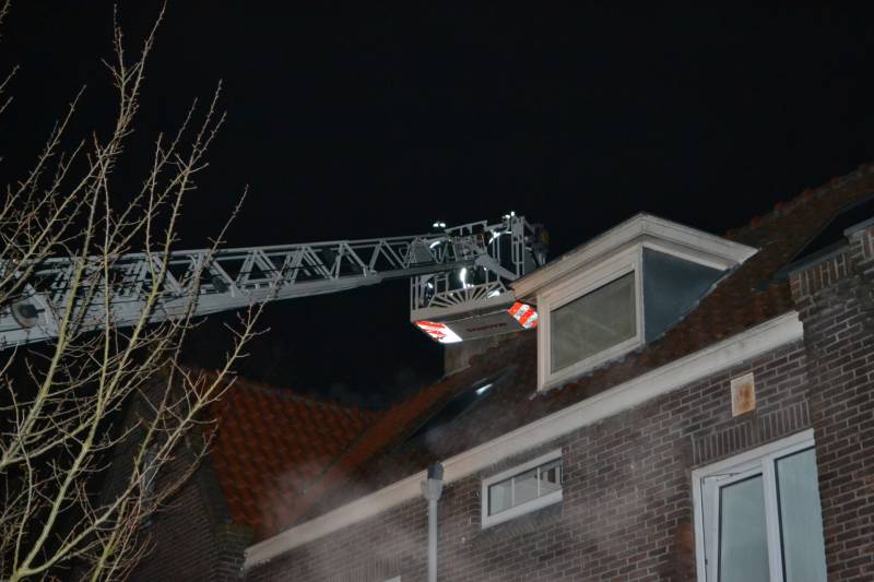 Brand in schoorsteen van woning