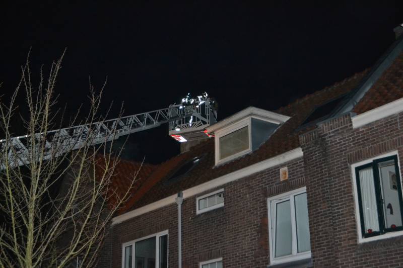 Brand in schoorsteen van woning